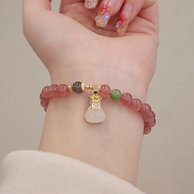 Natural strawberry quartz women's bracelet with geometric design and silver safety buckle