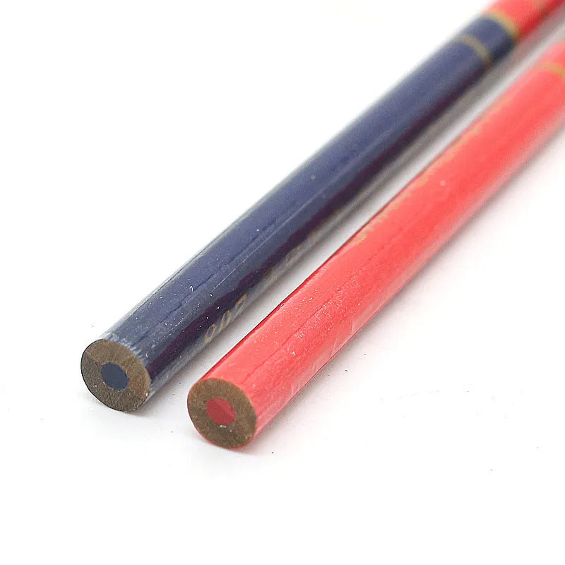 Ten red and blue round wooden carpenter's pencils for construction marking.