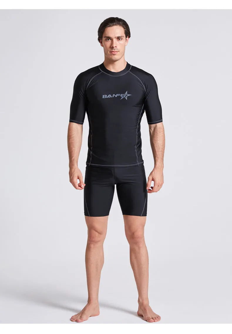 Men's blue half-sleeve quick-dry nylon swimsuit top and pants set for swimming and surfing.