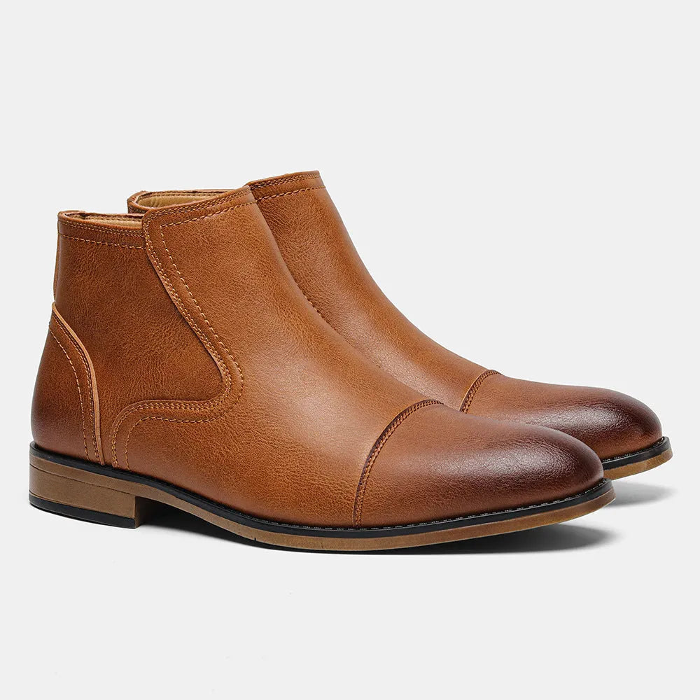 Men's brown plus size Chelsea boot with side zipper, round toe, and low heel.
