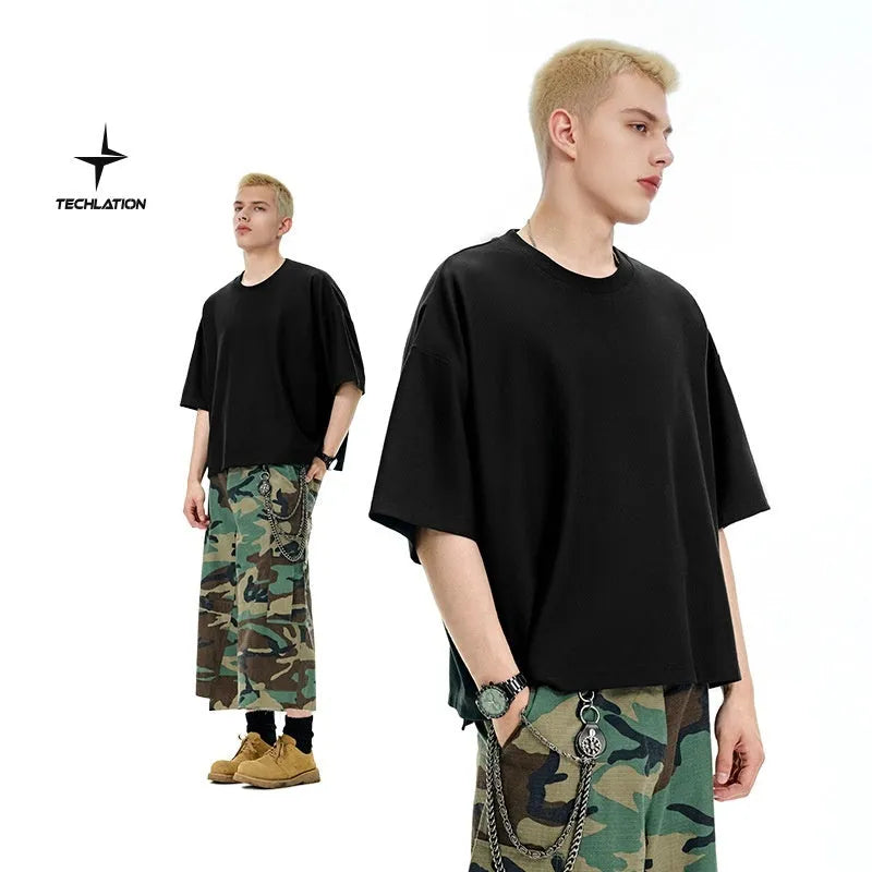 Men's loose fitting short sleeve pullover shirt in sand grey or black cotton-polyester blend fabric