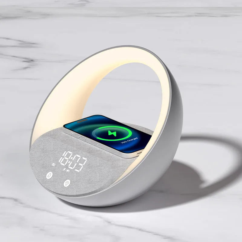 Beige wireless charging pad with digital clock, Bluetooth speaker, and ring of RGB LED mood lights.