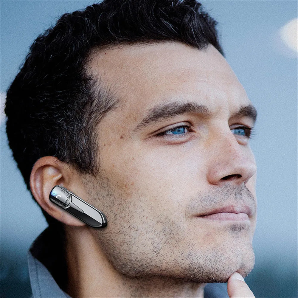 Single-ear Bluetooth V5.2 headset in black, white, silver, gold, or pink, 67x24x17mm, with 300mAh battery and charging cable.