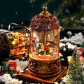 Christmas carousel music box plastic spinning ornament with old man and tree motif bronze finish