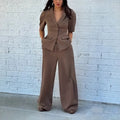 Brown polyester men's slim fit suit with long sleeves and matching trousers