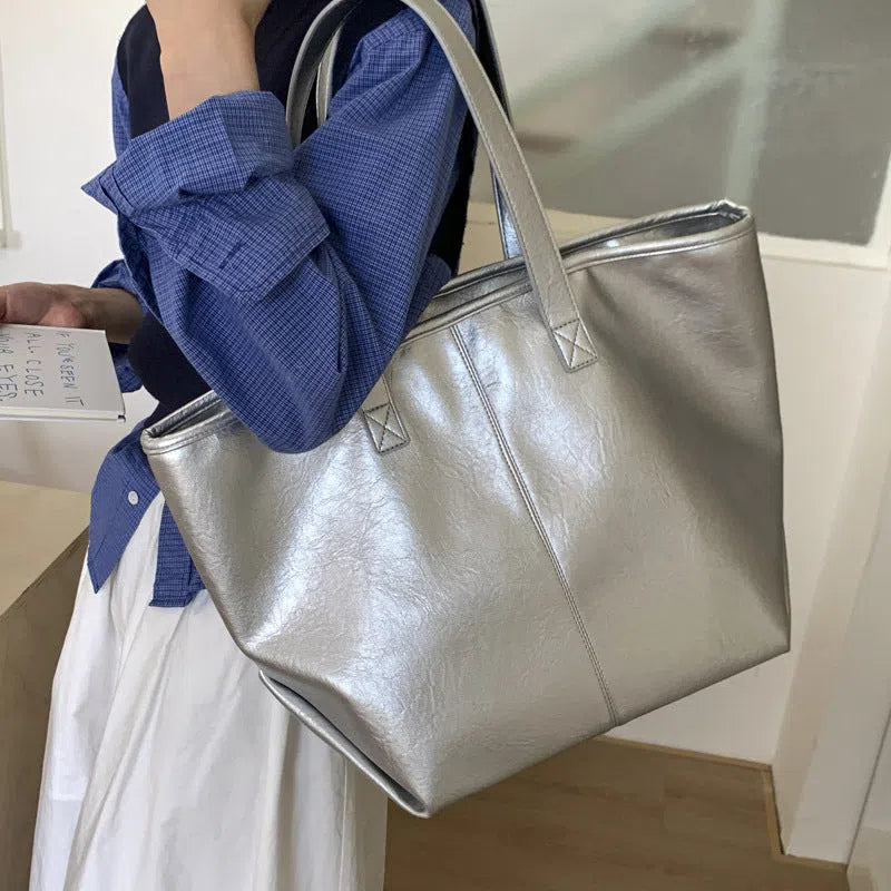 Large-capacity PU tote bag with double straps, 3D outer pocket, zip hidden pocket and phone pocket in black