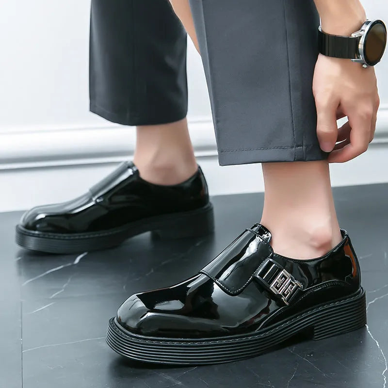 Men's glossy black platform loafers with a low hidden heel for summer wear.