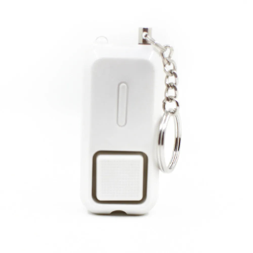 Compact pink personal safety alarm keyring with a button, shown next to its white retail box.