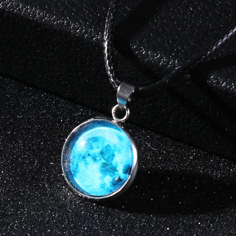Luminous alloy pendant necklace with constellation design in coloured glass, showing extension chain