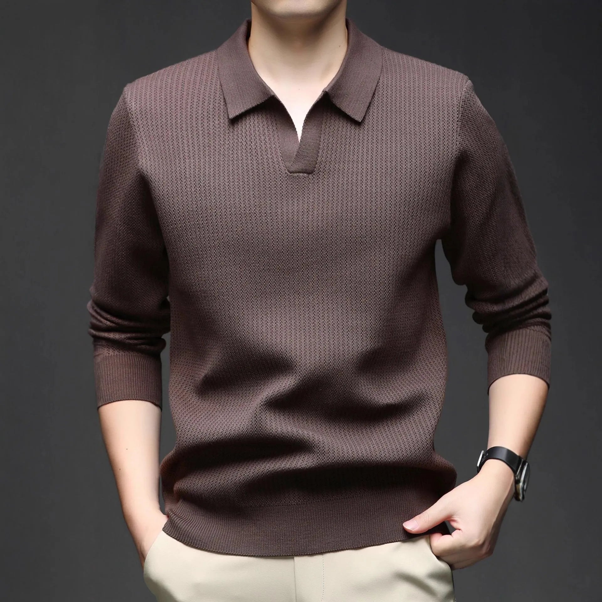 Man wearing a loose fit green casual pullover sweater, autumn casual style