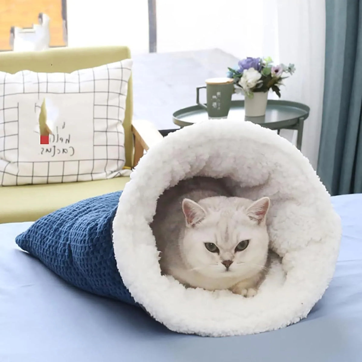 Gray cat winter sleeping bag with semi-enclosed cave design and crinkle sack for cats up to 6 kg