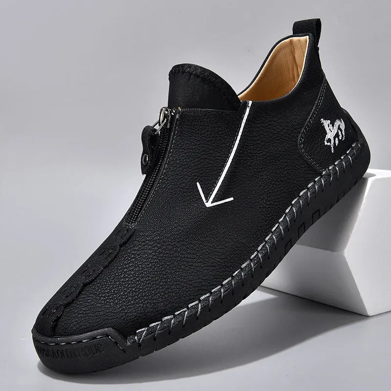 Men's brown casual leather-style boots with a front zip, round toe, and mid-calf height.