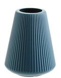 Blue, green, pink, and white melamine plastic decorative vase measuring 16cm by 20cm on a desktop.