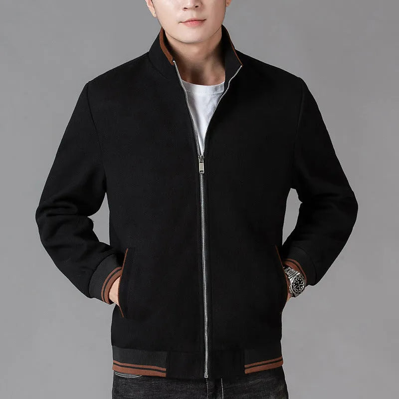 Men's grey polyester fleece jacket with long sleeves and side pockets shown in sports style