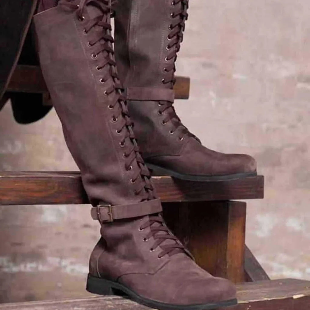 Women's long boots with lace-up front, low heel, artificial PU upper, rubber sole, in black colour