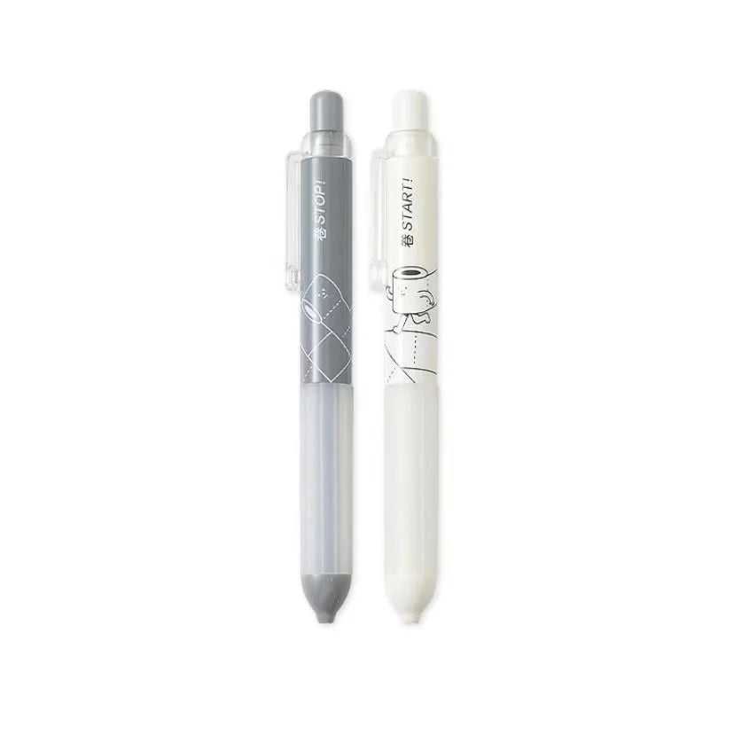 Black and white 0.5mm automatic pencils with cloud grip plastic holders on minimalist background