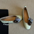 DIY flower rivet Mary Jane shoes in silver, black, or green with sheepskin upper, buckle strap, and flat rubber sole.