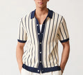 Men's white asymmetrical short sleeve knitted top with a lapel collar, shown on a model.