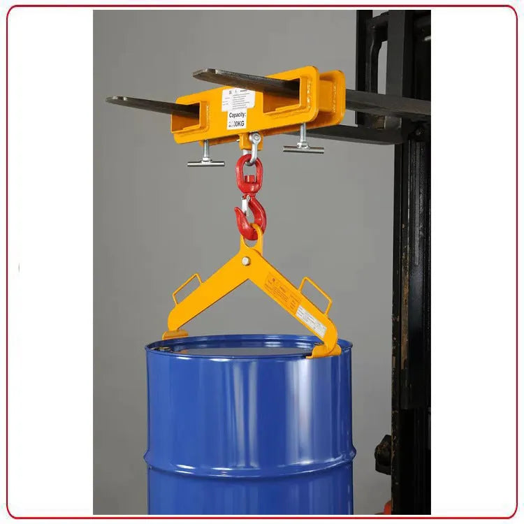 Iron forklift crane hook with rotatable drum and safety locking mechanism mounted on forklift forks.