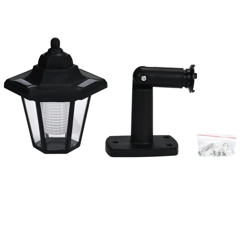 Black hexagonal solar wall lamp with monocrystal panel for outdoor garden lighting