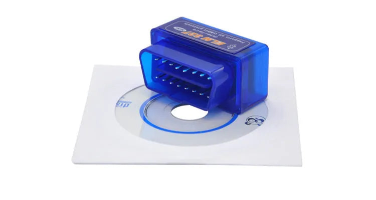 ELM327 Bluetooth OBD2 car diagnostic scanner plugged into a vehicle port
