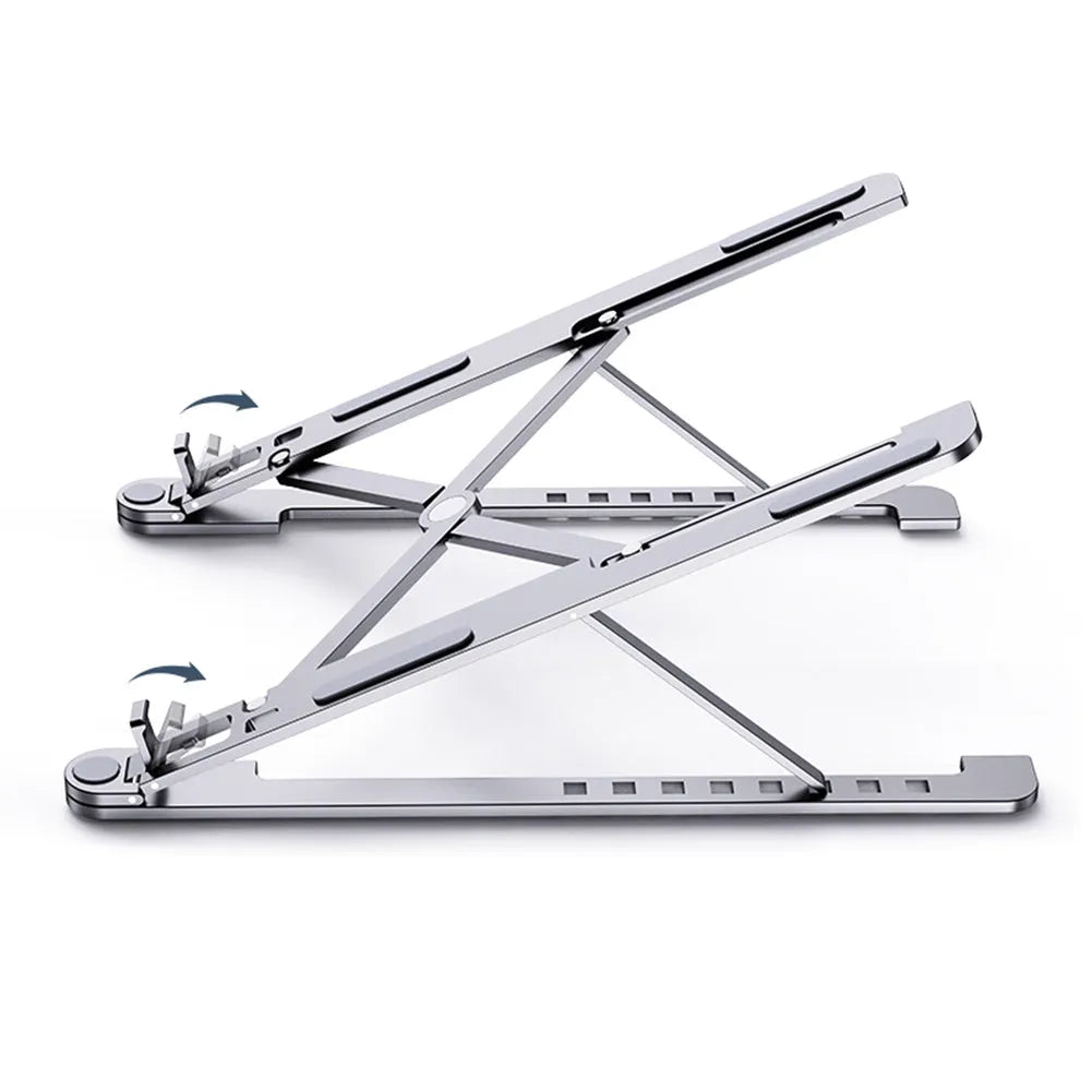 Deep grey foldable aluminium laptop stand holding a silver laptop at an angle.