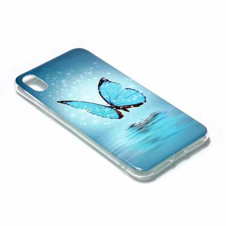 Glow in the dark iPhone case with a butterfly cartoon design on the back, showing luminous effect