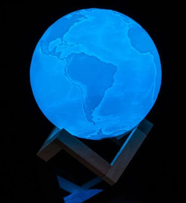 3D printed moon lamp showing detailed craters, with a touch metal ring at base for colour changing and dimming control.