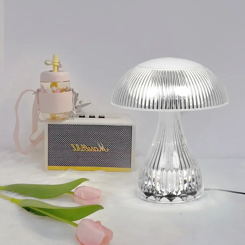 White three-colour changing USB rechargeable touch control night light on surface