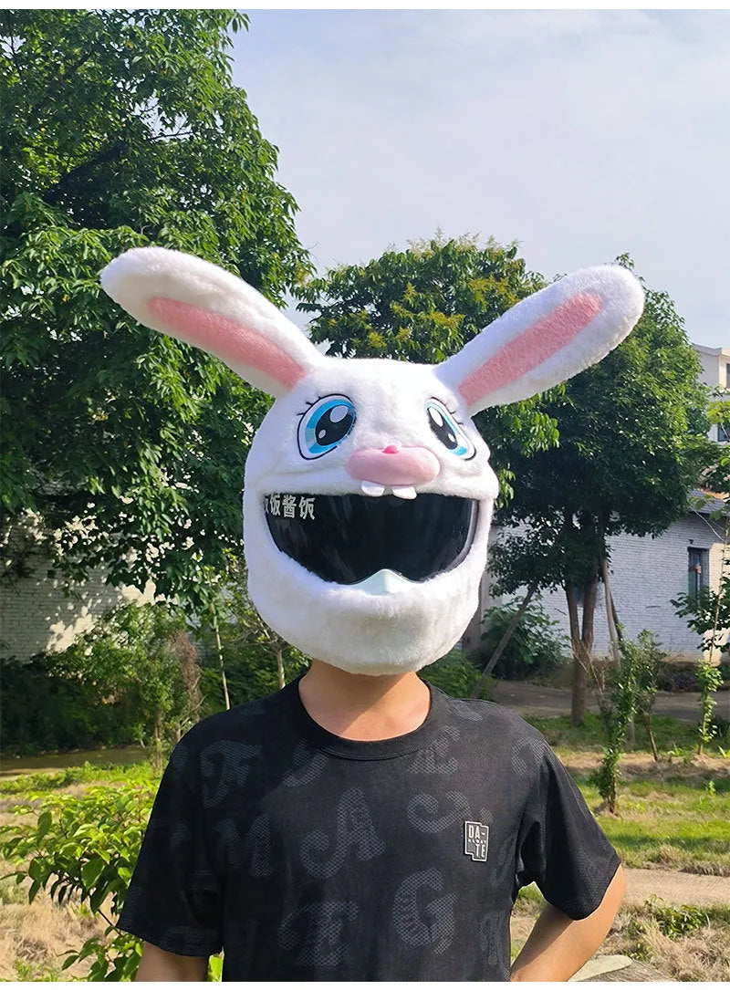 White plush rabbit head cover with long ears designed for an electric motorcycle helmet.