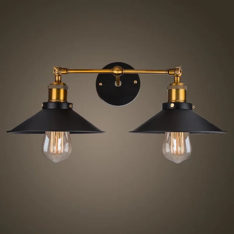 Black double head American retro industrial style iron wall lamp on a dark wall.