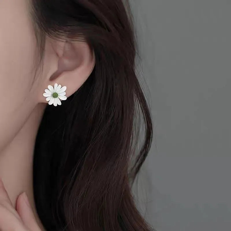 Cartoon flower earrings in alloy with blue and orange, white and green, or yellow and white two-tone colours