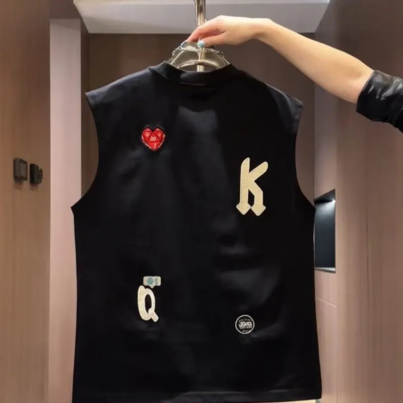 Men's black cotton sleeveless vest t-shirt with a cartoon graphic print, laid flat.
