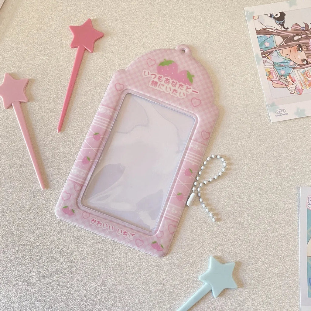 Cartoon PVC meal card holder pendant on a chain, showing strawberry and four-leaf clover design options.