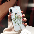 Handmade clear TPU iPhone case with real dried flowers preserved in epoxy resin