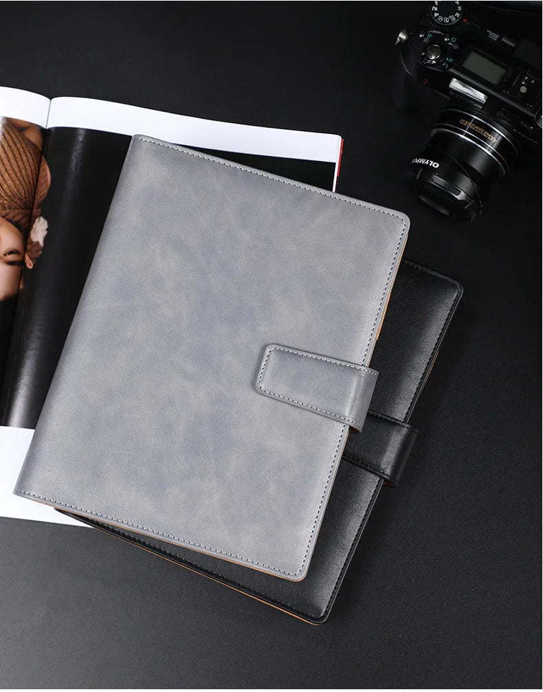 A5 hardcover PU binder notebook with metal buckle clip, shown in multiple colours.