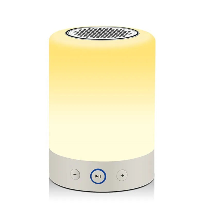 White mini portable Bluetooth sound light speaker with 5W output and touch controls on a surface