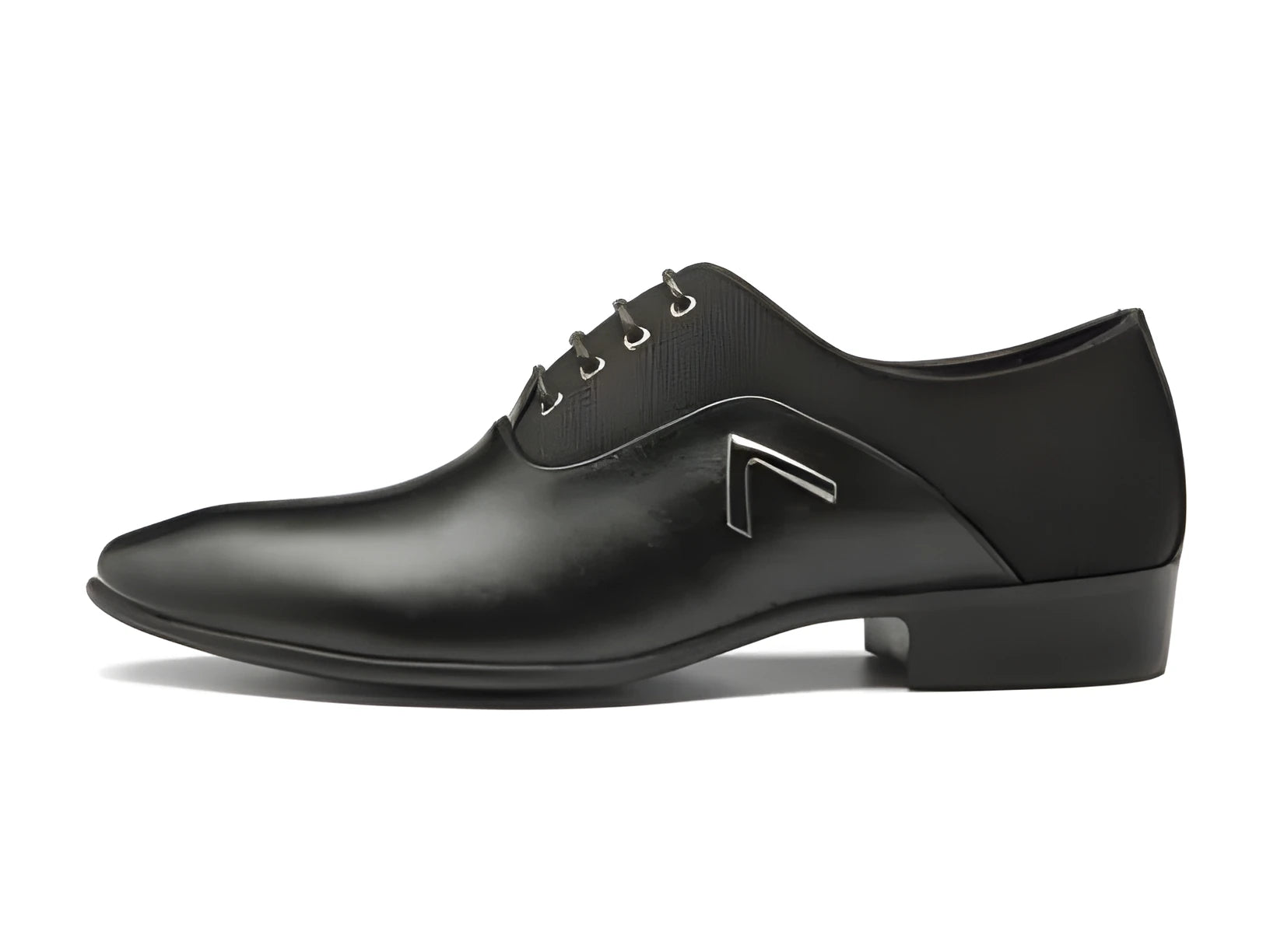 Men's black oxford shoes with low upper height and rubber sole on size chart background