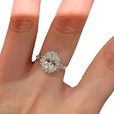 Adjustable silver geometric ellipse bridal bouquet ring with diamond surface treatment