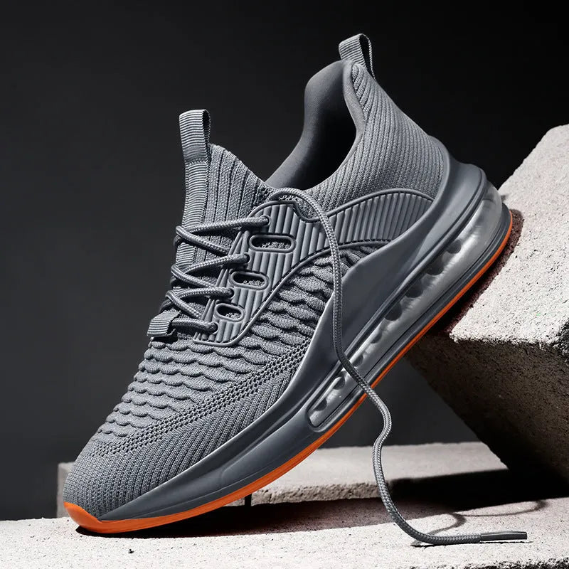 Men's black mesh running shoes with low top, round toe, and lace-up design on rubber sole