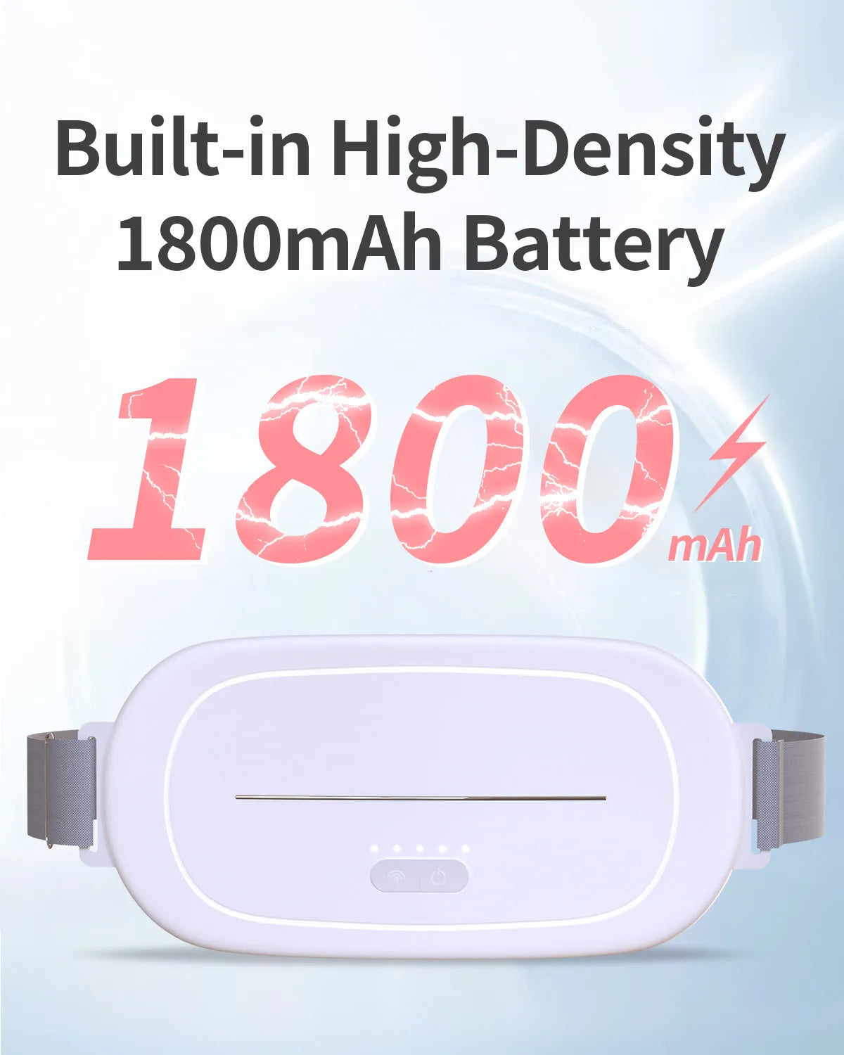 A white, cordless uterine warming device with soft silicone pads and a magnetic charging cable.