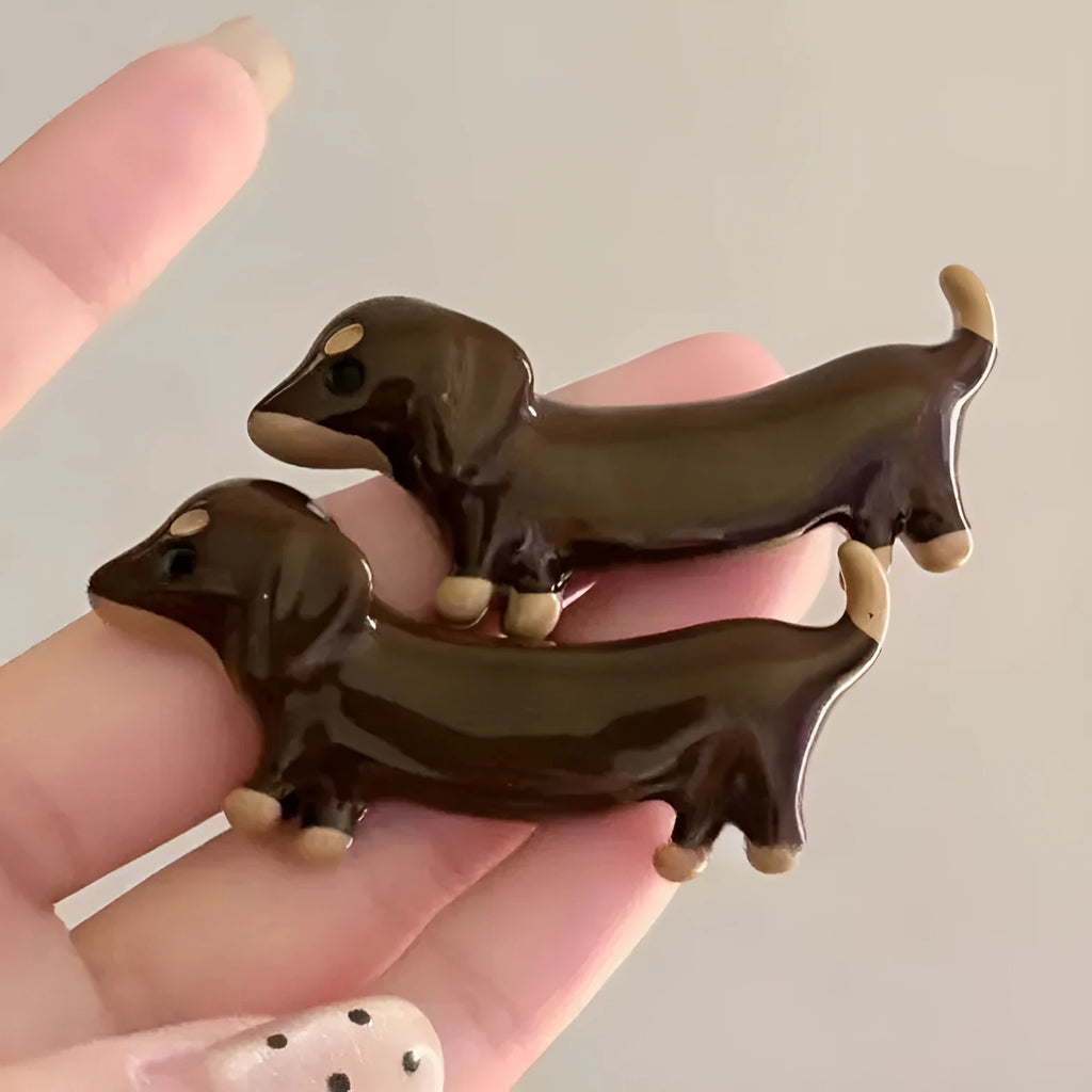 Dachshund dog design hair barrettes with electroplated finish, available as single clip or pair