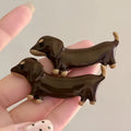 Dachshund dog design hair barrettes with electroplated finish, available as single clip or pair