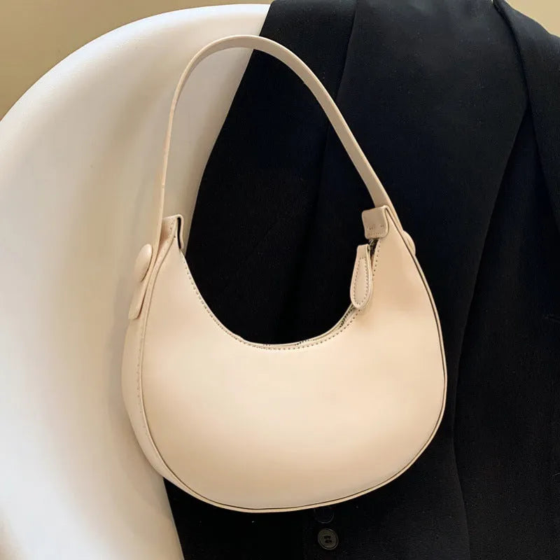 Retro dumpling shape shoulder bag in PU leather showing dimensions 21x20x6cm with zipper change bag interior
