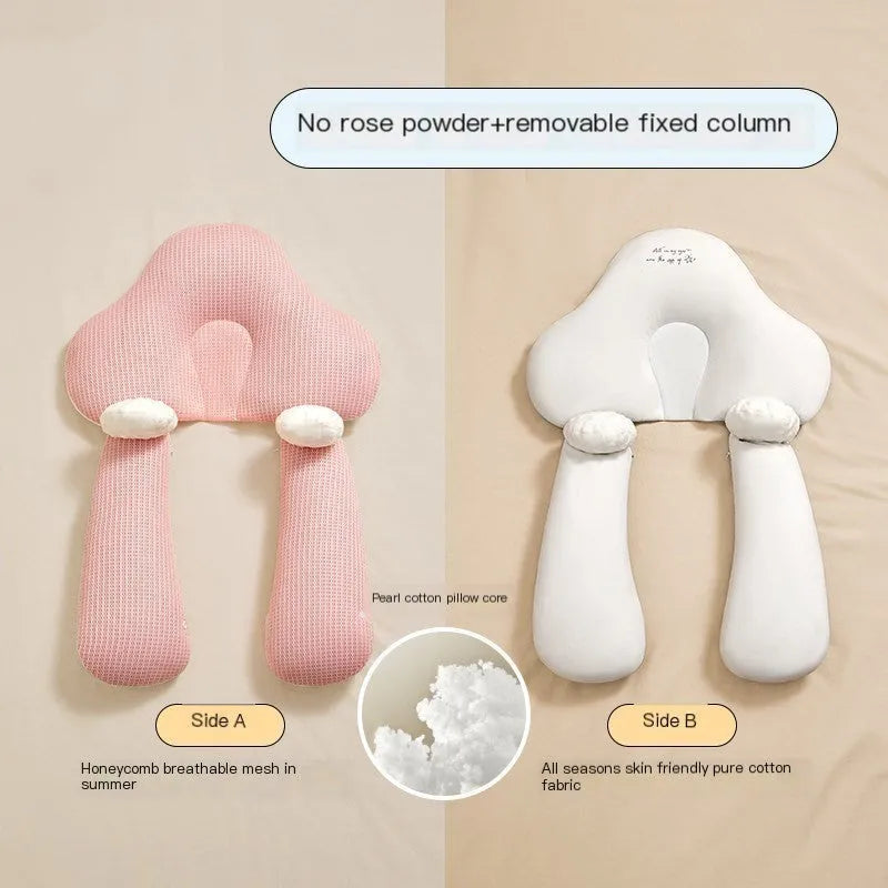 Blue and white U-shaped baby head shaping pillow made of pure cotton on a neutral background.