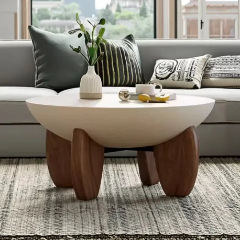 White solid wood adjustable height coffee table with storage compartment.