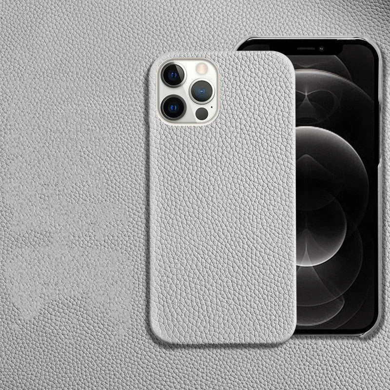 Genuine leather protective case for Apple iPhone in a selection of colours on a table.