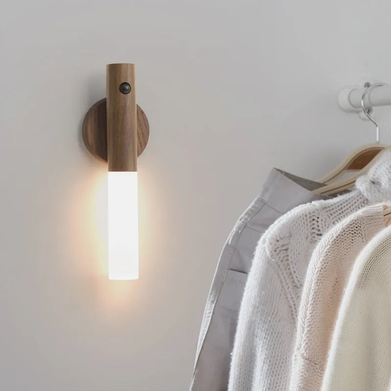 Smart motion sensor LED desk lamp made of solid wood and acrylic with a rechargeable battery.