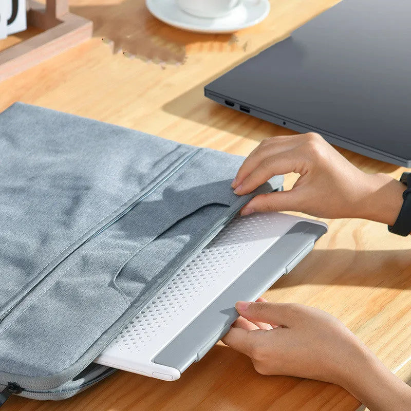 Portable alloy notebook stand for laptops under 16 inches, slim 0.8mm design in black colour