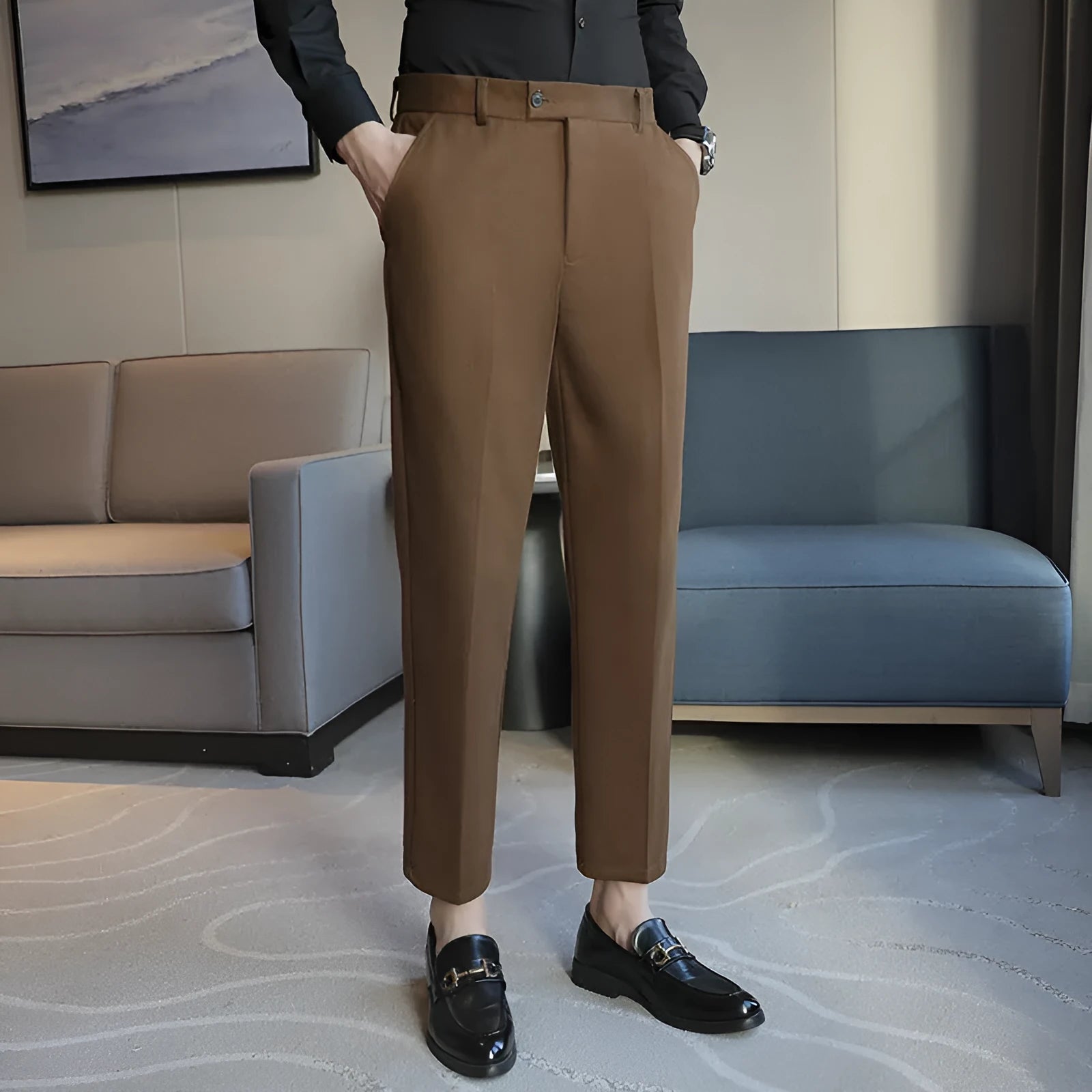 Straight retro brown corduroy trousers with elastic waistband on hanger